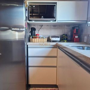 Casa com 102m², 2 dormitórios, 1 suíte, 2 vagas no bairro Igra Sul em Torres para Comprar