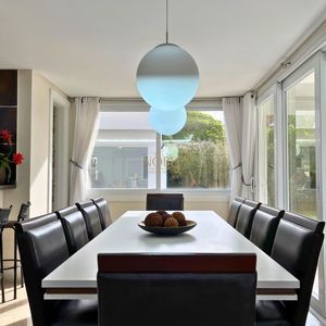 Casa com 600m², 4 dormitórios, 1 suíte, 4 vagas no bairro Igra Norte em Torres para Comprar