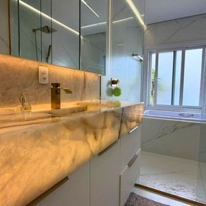 Casa com 258m², 4 dormitórios, 4 suítes, 2 vagas no Reserva das Águas em Torres para Comprar