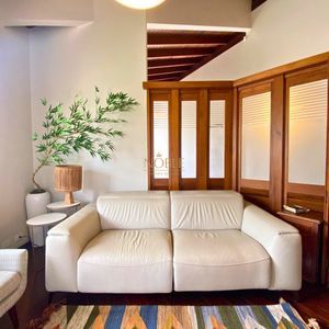 Casa com 518m², 5 dormitórios, 2 suítes, 2 vagas no bairro Praia Grande em Torres para Comprar