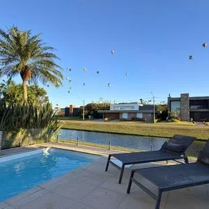 Casa de Condomínio com 206m², 4 dormitórios, 4 suítes, 2 vagas no Reserva das Águas em Torres para Comprar