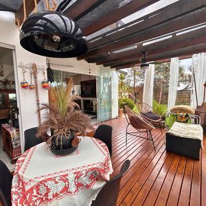 Casa com 170m², 2 dormitórios, 3 vagas no bairro Centenário em Torres para Comprar