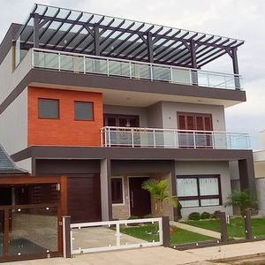 Casa com 500m², 4 dormitórios, 4 suítes, 2 vagas no bairro Bella Torres em Passo de Torres para Comprar