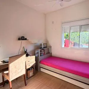 Casa com 172m², 3 dormitórios, 1 suíte, 2 vagas no bairro São Jorge em Torres para Comprar
