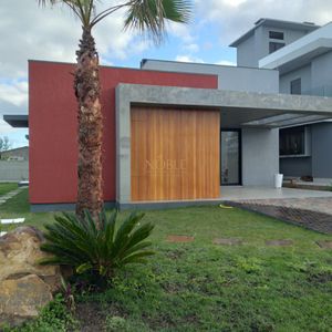 Casa de Condomínio com 180m², 3 dormitórios, 3 suítes, 2 vagas no Reserva das Águas em Torres para Comprar