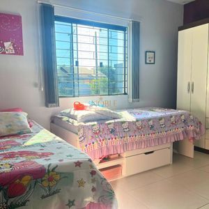 Casa, 3 dormitórios, 1 suíte, 2 vagas no bairro Igra Sul em Torres para Comprar