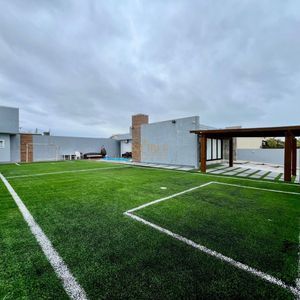 Casa com 670m², 5 dormitórios, 3 suítes, 3 vagas no bairro Bellatorres em Passo de Torres para Comprar