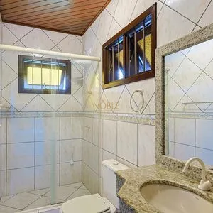Casa, 4 dormitórios, 1 suíte, 2 vagas no bairro Itapeva Norte em Torres para Comprar