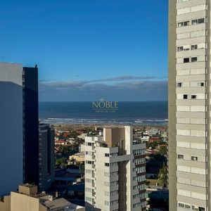 Apartamento com 70m², 2 dormitórios, 1 suíte, 2 vagas no Toronto em Torres para Comprar