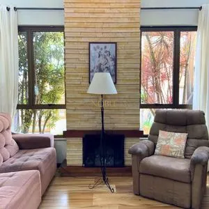 Casa com 272m², 4 dormitórios, 1 suíte, 3 vagas no bairro Igra Norte em Torres para Comprar