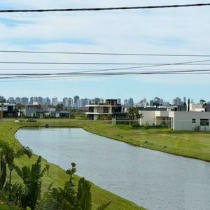Casa com 258m², 4 dormitórios, 4 suítes, 2 vagas no Reserva das Águas em Torres para Comprar