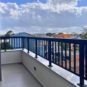 Apartamento com 64m², 2 dormitórios, 1 suíte, 1 vaga no Aston em Torres para Comprar