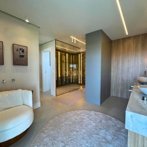 Casa de Condomínio com 311m², 3 dormitórios, 3 suítes, 2 vagas no Reserva das Águas em Torres para Comprar