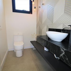 Casa de Condomínio com 262m², 3 dormitórios, 1 suíte, 2 vagas no Reserva das Águas em Torres para Comprar