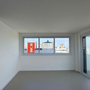 Apartamento com 118m², 3 dormitórios, 2 suítes, 2 vagas no Punta Del Sole em Torres para Comprar