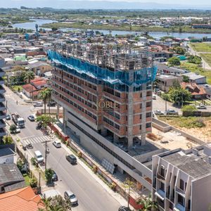 Apartamento com 98m², 2 dormitórios, 2 suítes, 2 vagas no Punta Del Sole em Torres para Comprar
