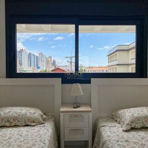 Apartamento com 108m², 3 dormitórios, 1 suíte, 2 vagas no Residencial DI Capri em Torres para Comprar