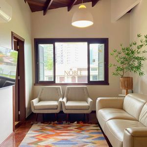 Casa com 518m², 5 dormitórios, 2 suítes, 2 vagas no bairro Praia Grande em Torres para Comprar