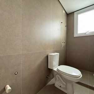 Apartamento com 72m², 2 dormitórios, 1 suíte, 1 vaga no Topazio em Torres para Comprar