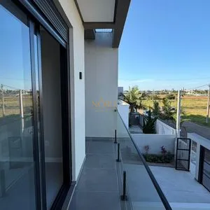 Geminado com 141m², 3 dormitórios, 1 suíte, 2 vagas no bairro Morada das Palmeiras em Torres para Comprar