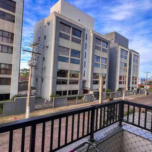 Apartamento com 60m², 2 dormitórios, 1 suíte, 1 vaga no Aston em Torres para Comprar