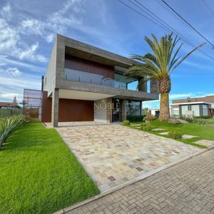 Casa de Condomínio, 5 dormitórios, 5 suítes, 2 vagas no Ocean Side em Torres para Comprar