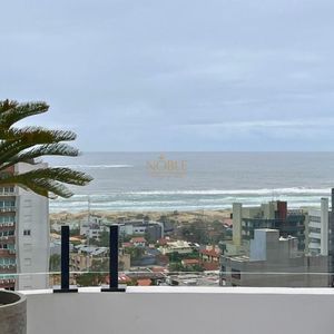 Apartamento com 106m², 3 dormitórios, 1 suíte, 1 vaga no Toronto em Torres para Comprar