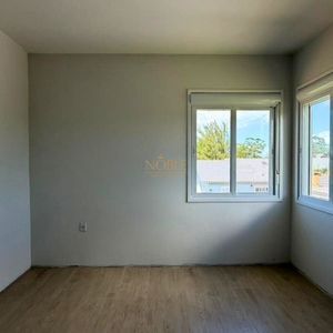 Casa com 226m², 3 dormitórios, 1 suíte, 2 vagas no bairro Paraíso em Torres para Comprar