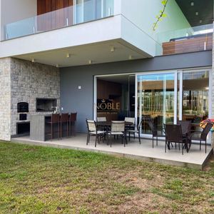 Casa de Condomínio, 4 dormitórios, 4 suítes, 2 vagas no Condomínio Ilhas Park em Torres para Comprar