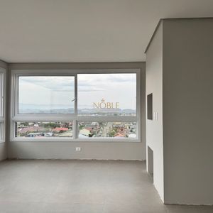 Apartamento com 72m², 2 dormitórios, 1 suíte, 1 vaga no Topazio em Torres para Comprar