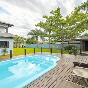 Casa, 4 dormitórios, 1 suíte, 2 vagas no bairro Itapeva Norte em Torres para Comprar