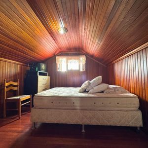 Casa com 220m², 4 dormitórios, 4 suítes, 2 vagas no bairro Igra Norte em Torres para Comprar