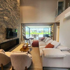 Casa de Condomínio com 390m², 4 dormitórios, 4 suítes, 2 vagas no Reserva das Águas em Torres para Comprar