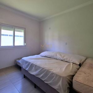 Casa, 5 dormitórios, 1 suíte, 3 vagas no bairro Praia Paraíso em Torres para Comprar