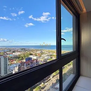 Apartamento com 140m², 3 dormitórios, 3 suítes, 2 vagas no Voga em Torres para Comprar