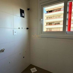 Apartamento com 118m², 3 dormitórios, 3 suítes, 1 vaga no Punta Del Sole em Torres para Comprar