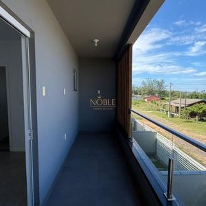 Sobrado com 148m², 3 dormitórios, 1 suíte, 2 vagas no bairro Tapera em Passo de Torres para Comprar