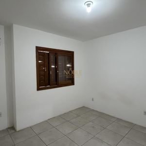 Geminado com 60m², 2 dormitórios, 1 vaga no bairro Morada das Palmeiras em Torres para Comprar