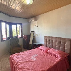 Casa, 6 dormitórios, 2 vagas no bairro Praia da Cal em Torres para Comprar