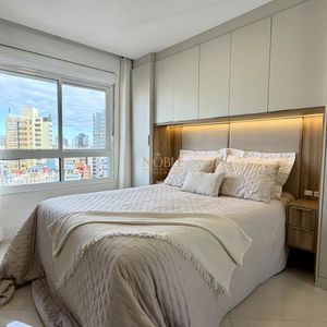 Apartamento com 105m², 3 dormitórios, 2 vagas no Michelângelo em Torres para Comprar