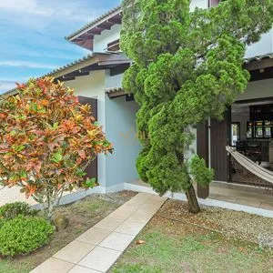 Casa, 4 dormitórios, 1 suíte, 2 vagas no bairro Itapeva Norte em Torres para Comprar