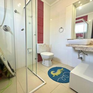 Sobrado com 350m², 4 dormitórios, 4 suítes, 2 vagas no bairro Centenário em Torres para Comprar