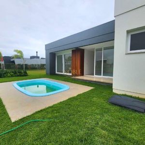 Casa, 3 dormitórios, 3 suítes, 2 vagas no Reserva das Águas em Torres para Comprar