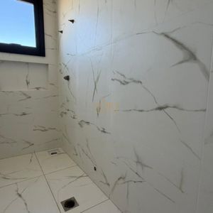 Geminado com 110m², 3 dormitórios, 1 suíte, 1 vaga no bairro Morada das Palmeiras em Torres para Comprar