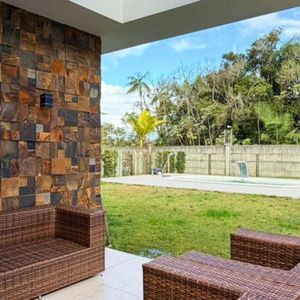Casa de Condomínio com 207m², 3 dormitórios, 3 suítes, 2 vagas no Reserva das Águas em Torres para Comprar