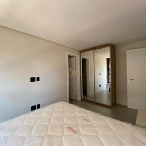 Apartamento com 60m², 2 dormitórios, 1 suíte, 1 vaga no Aston em Torres para Comprar