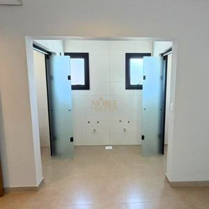 Casa com 215m², 3 dormitórios, 1 suíte, 2 vagas no bairro Morada das Palmeiras em Torres para Comprar