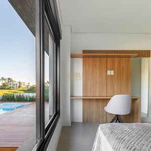 Casa de Condomínio com 218m², 3 dormitórios, 3 suítes, 2 vagas no Condomínio Ilhas Park em Torres para Comprar