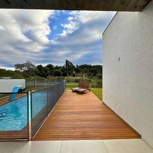 Casa de Condomínio com 201m², 3 dormitórios, 3 suítes, 3 vagas no Reserva das Águas em Torres para Comprar