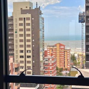 Apartamento com 100m², 2 dormitórios, 2 suítes, 2 vagas no Origem em Torres para Comprar